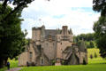 Castle Fraser with newer extensions forming courtyard. Aberdeenshire, Scotland.