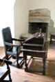 Bailiff's Room with writing desk on table & great chair at Castle Fraser. Aberdeenshire, Scotland.