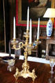 Candelabra supported by sphinxes on dining table at Fyvie Castle. Turriff, Scotland.