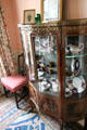 Vitrine displaying porcelain collection in Seton room at Fyvie Castle. Turriff, Scotland.