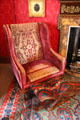 Armchair with footstool in library at Fyvie Castle. Turriff, Scotland.