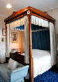Four-poster bed with hangings in Victoria bedroom at Haddo House. Methlick, Scotland.