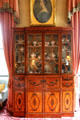 Glass fronted marquetry display cabinet in morning room at Haddo House. Methlick, Scotland.