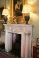Drawing room fireplace with pair of lamps & mantle clock at Haddo House. Methlick, Scotland.