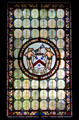 Stained glass window with coat of arms at Brodie Castle. Brodie, Scotland.