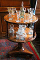 Glassware on round table in dining room at Brodie Castle. Brodie, Scotland