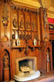 Carved fireplace in red drawing room at Brodie Castle. Brodie, Scotland.