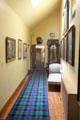 Collection of Scottish paintings in Tartan Passage at Cawdor Castle. Cawdor, Scotland.