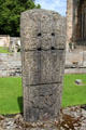 Pictish stone with cross at Elgin Cathedral. Elgin, Scotland.