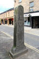 Sculpted stone with fishing symbols on Elgin High Street. Elgin, Scotland.