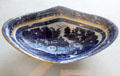 Caughley Porcelain dessert dish transfer printed with cobalt blue mock Chinese 'Full Nankin' scene at Coalport China Museum. Ironbridge, England.