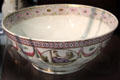 Caughley Porcelain punch bowl painted with classical scene panels linked with pink & blue border at Coalport China Museum. Ironbridge, England.