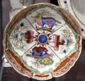 Caughley Porcelain saucer painted with dragons & flowers in pink & blue at Coalport China Museum. Ironbridge, England.