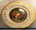 Plate with fruit painting by F. Howard for crown Coalport at Coalport China Museum. Ironbridge, England.