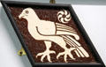 Tile painted with hawk by Craven Dunnill & Co or Maw & Co at Jackfield Tile Museum. Ironbridge, England.