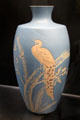 Salopian vase incised with peacock on light bluebackground by Benthall Pottery at Jackfield Tile Museum. Ironbridge, England.