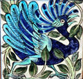 Peacock hand-painted tile by William De Morgan at Jackfield Tile Museum. Ironbridge, England.