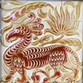 Griffin relief-moulded lustre tile by William De Morgan with Halsey Ricardo at Jackfield Tile Museum. Ironbridge, England.