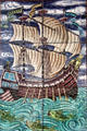 Sailing ship with monkey at helm hand-painted tile panel by William De Morgan at Jackfield Tile Museum. Ironbridge, England.