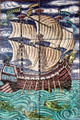 Sailing ship with monkey at helm hand-painted tile panel by William De Morgan at Jackfield Tile Museum. Ironbridge, England