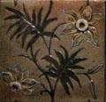 Floral tile by Martin Brothers at Gladstone Pottery Museum. Longton, Stoke, England.