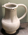 Salt-glazed stoneware puzzle jug made in North Straffordshire at Potteries Museum & Art Gallery. Hanley, Stoke-on-Trent, England.