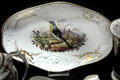 Bone china dish with bird painting & gilding by Charles Bourne of Fenton, Stoke-upon-Trent at Potteries Museum & Art Gallery. Hanley, Stoke-on-Trent, England.