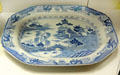Ironstone china meat dish transfer-printed with chinoiserie willow pattern by C.J. & G.M. Mason of Lane Delph, Fenton, Stoke-upon-Trent at Potteries Museum & Art Gallery. Hanley, Stoke-on-Trent, England.