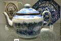 Example of under-glaze printing on porcelain teapot by Miles Mason of Fenton, Staffordshire at Potteries Museum & Art Gallery. Hanley, Stoke-on-Trent, England.