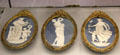 Wedgwood blue jasper medallions with neo-classical themes by several artists in ormolu frames by Matthew Boulton at World of Wedgwood. Barlaston, Stoke, England.