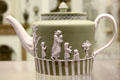 Wedgwood pale green jasper teapot depicting Domestic Employment after design by Lady Templetown at World of Wedgwood. Barlaston, Stoke, England.