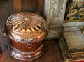 English copper coal vase with ring side handles in drawing room at Wightwick Manor. Wolverhampton, England.