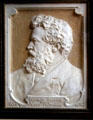 William Morris Poet, Artist, Craftsman relief profile portrait at Wightwick Manor. Wolverhampton, England.