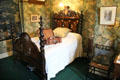 Acanthus wallpaper bedroom with spiral posted bed at Wightwick Manor. Wolverhampton, England.