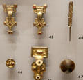 Anglo-Saxon silver gilt brooches, pinbeater & pendant with garnets found in female burial at Ashmolean Museum. Oxford, England.