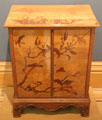 Two-doors side cabinet with marquetry of magnolia branches, butterflies & flowers from France at Ashmolean Museum. Oxford, England.