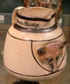 Salt glazed stoneware jug with fox's face by Martin Brothers of Fulham at Ashmolean Museum. Oxford, England