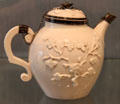 Porcelain blanc de Chine teapot with silver mounts by Saint-Cloud of France at Ashmolean Museum. Oxford, England.