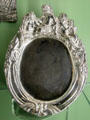 Silver mirror possibly Michiel de Bruyn van Berendrecht after Adam van Vianen at Ashmolean Museum. Oxford, England.