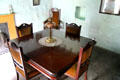 Dining table with oil lamp in Coshkib Hill Farm at Ulster Folk Park. Belfast, Northern Ireland.