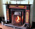 Dining room fireplace in Drumnahunshin Farm at Ulster Folk Park. Belfast, Northern Ireland.