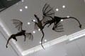 Sculpted dragons from Game of Thrones hang in atrium of Ulster Museum. Belfast, Northern Ireland.