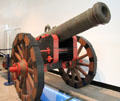 Bronze siege gun from wreck of Spanish Armada ship La Trinidad Valencera recovered from Glengivney Bay in County Donegal, Ireland on replica carriage at Ulster Museum. Belfast, Northern Ireland.
