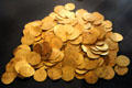 Gold coins recovered from wreck of Spanish Armada ship off coast of Ireland at Ulster Museum. Belfast, Northern Ireland.