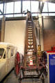 Fireman's ladder on wheels at Ulster Transport Museum. Belfast, Northern Ireland.
