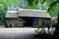 Thatched forge building at Ulster American Folk Park. Omagh, Northern Ireland.