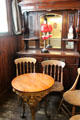 Pub interior seating of J Reilly Publican/Grocer at Ulster American Folk Park. Omagh, Northern Ireland.