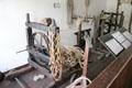 Ropemaking machinery in D Reynolds Ropemaker shop at Ulster American Folk Park. Omagh, Northern Ireland.