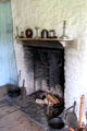 Fireplace in Western Pennsylvania Log House at Ulster American Folk Park. Omagh, Northern Ireland.