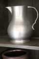 Pewter pitcher in West Virginia McCallister House at Ulster American Folk Park. Omagh, Northern Ireland.